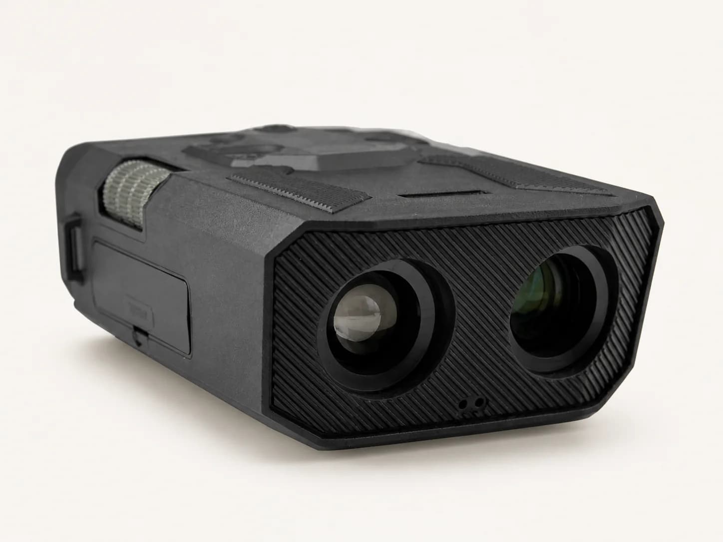 ERAINS ES-HNV1000 starlight digital night vision binocular on a warm light studio background